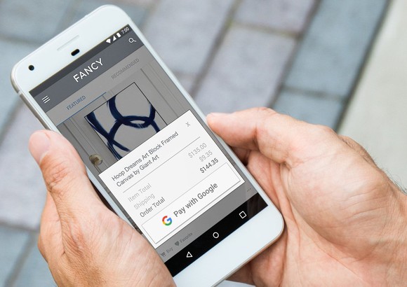 Person using Pay with Google on an Android phone