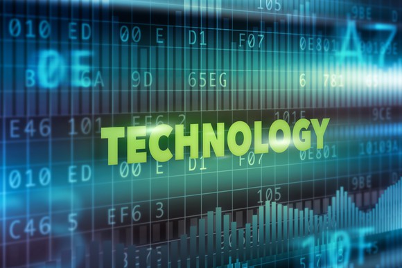 The word "technology" hovering in front of computer codes.
