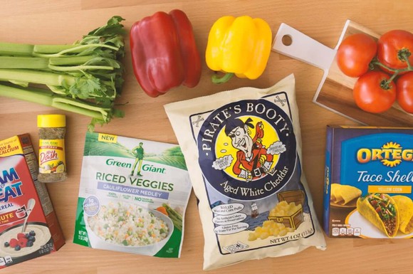 Food packages including Green giant vegetables, Cream of Wheat, Pirate's Booty, and Ortega owned by B&G Foods