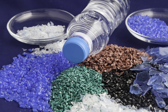 Colored plastic resins on a table.