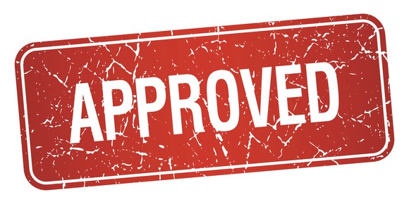 red stamp that says approved