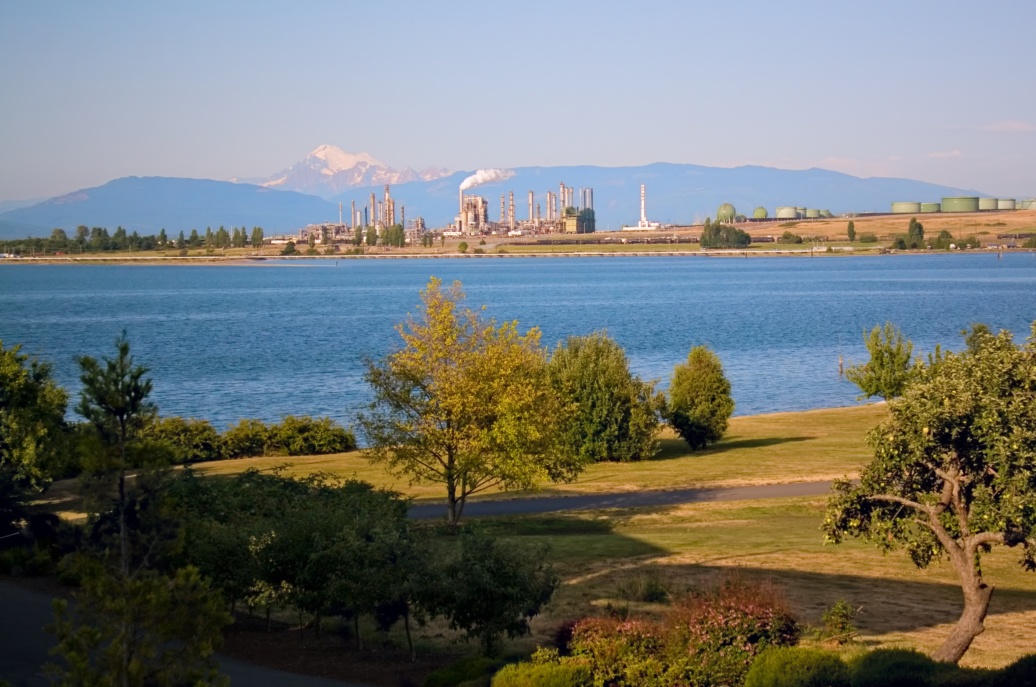 Oil refinery on the Puget Sound with Mount Baker in the background.