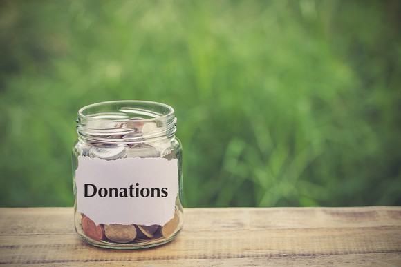 Jar with coins labeled donations