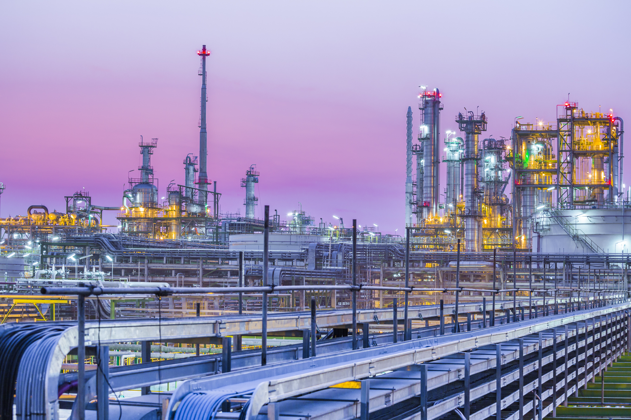 Oil refinery at dusk.