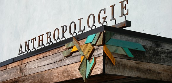 An Anthropologie sign on top of a storefront