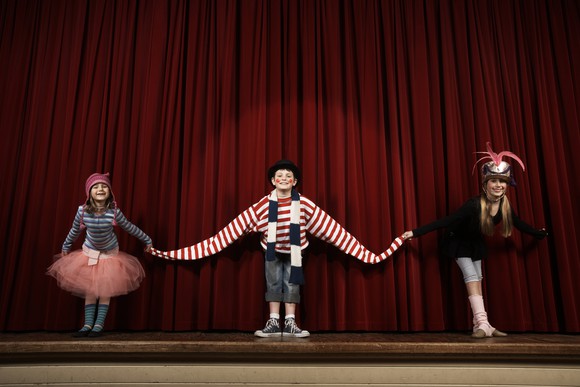 Three kids on stage