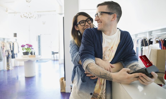 A couple using a Bank of America credit card.