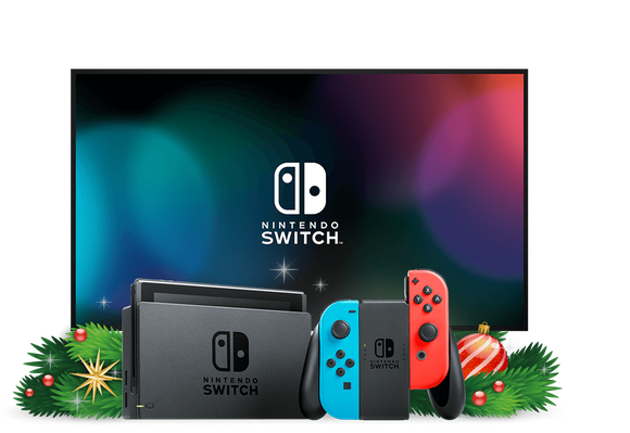The Nintendo Switch game console in front of a TV screen