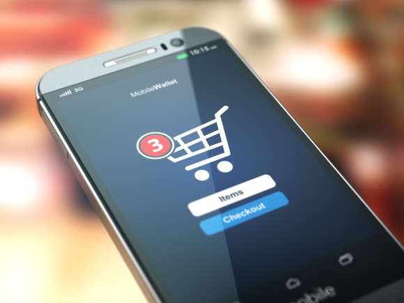 A smartphone checking out three items with a mobile wallet