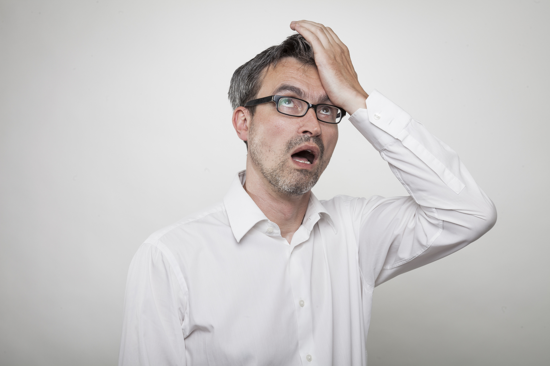 Getty Facepalm Man With Glasses