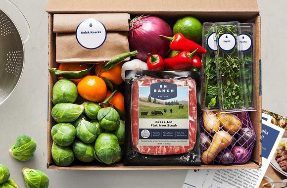 A box of Blue Apron ingredients.