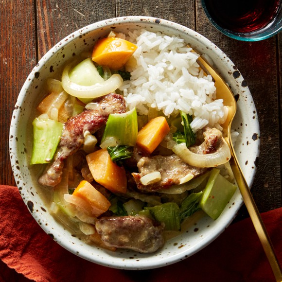 A bowl of yellow curry beef