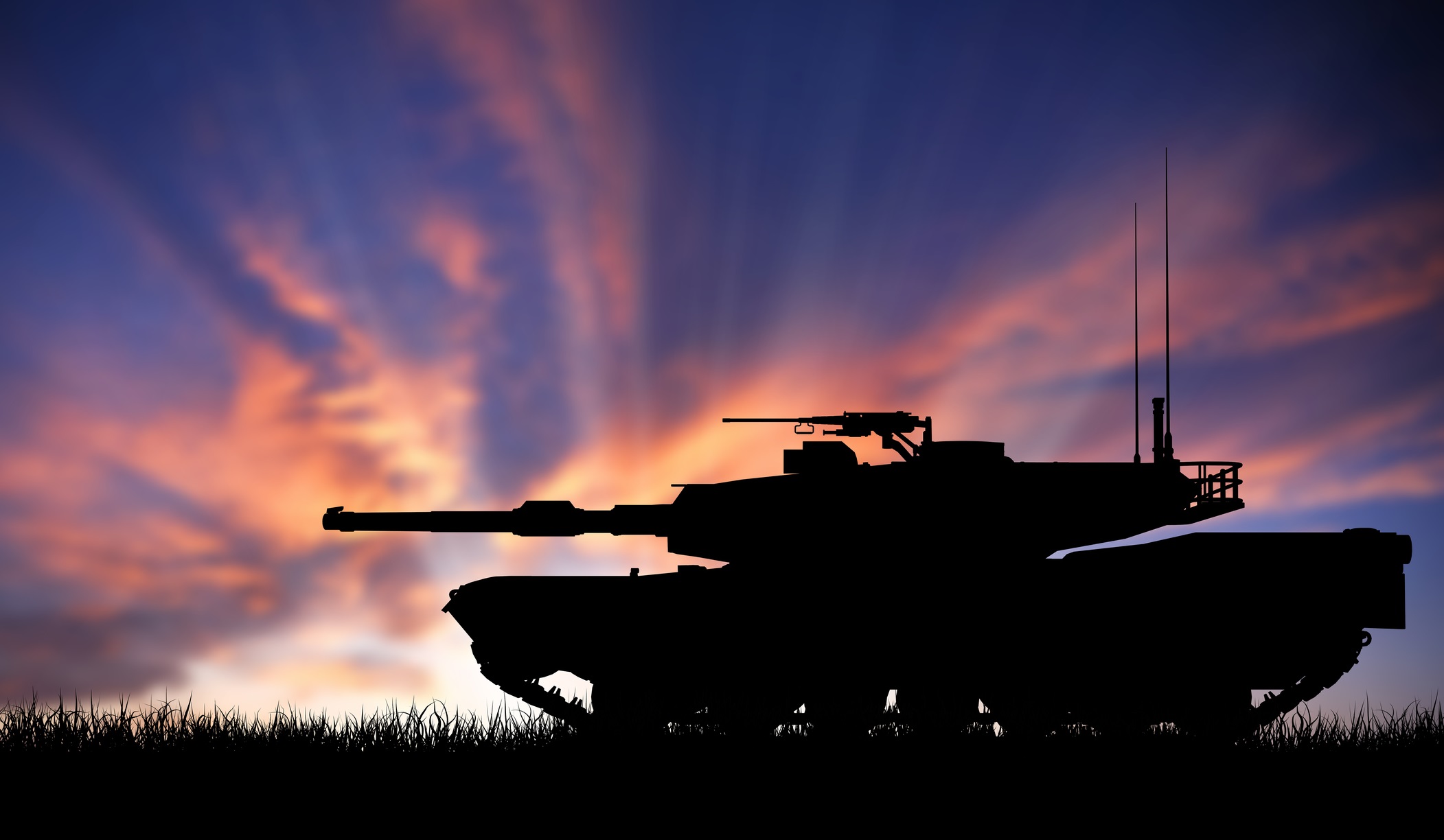 Tank in front of a sunset