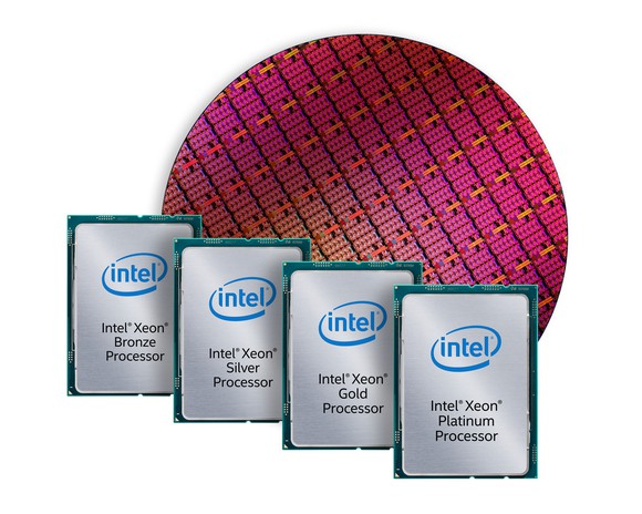 A wafer of Intel Xeon processors with complete, packaged Xeon Scalable processors in front of it.