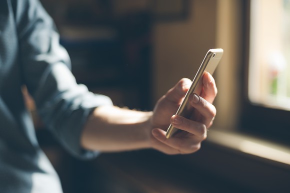 Person looking at a phone
