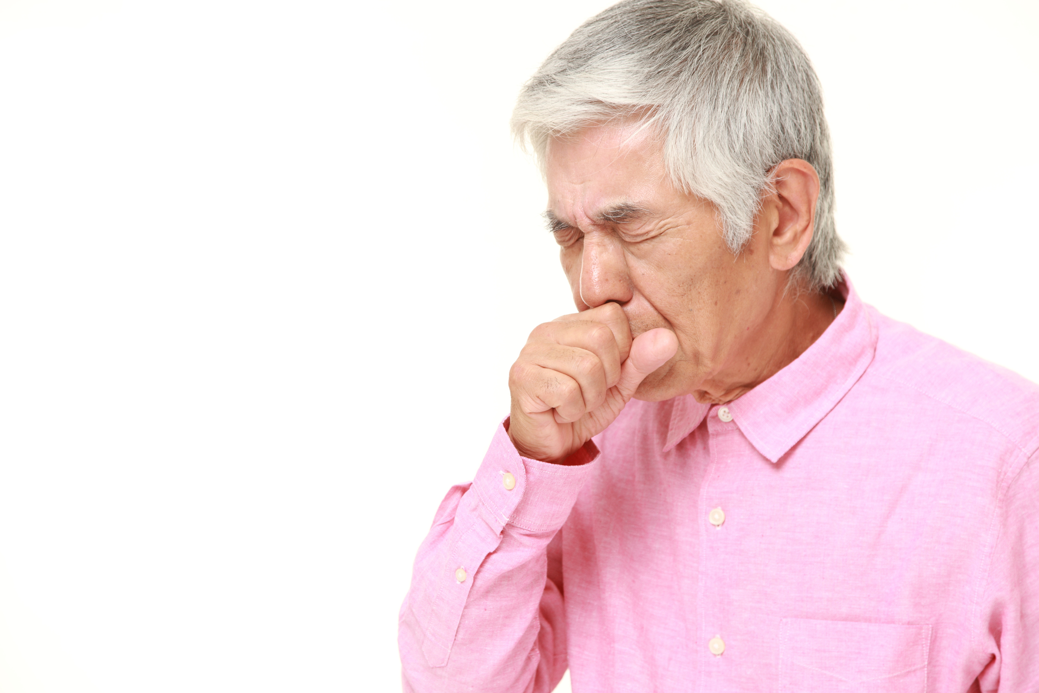 Senior man coughing