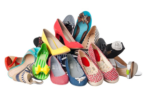 A pile of female summer shoes.