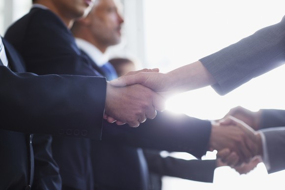 Business people shaking hands