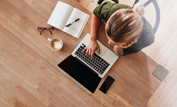 A woman using a laptop