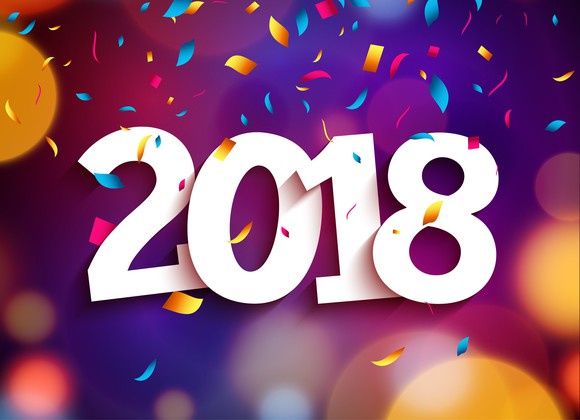 2018 in white letters on a background of colored circles and confetti