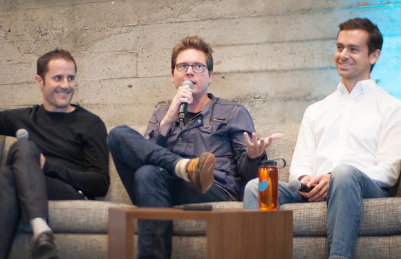 Twitter co-founders Ev Williams, Biz Stone, and Jack Dorsey sitting on a couch