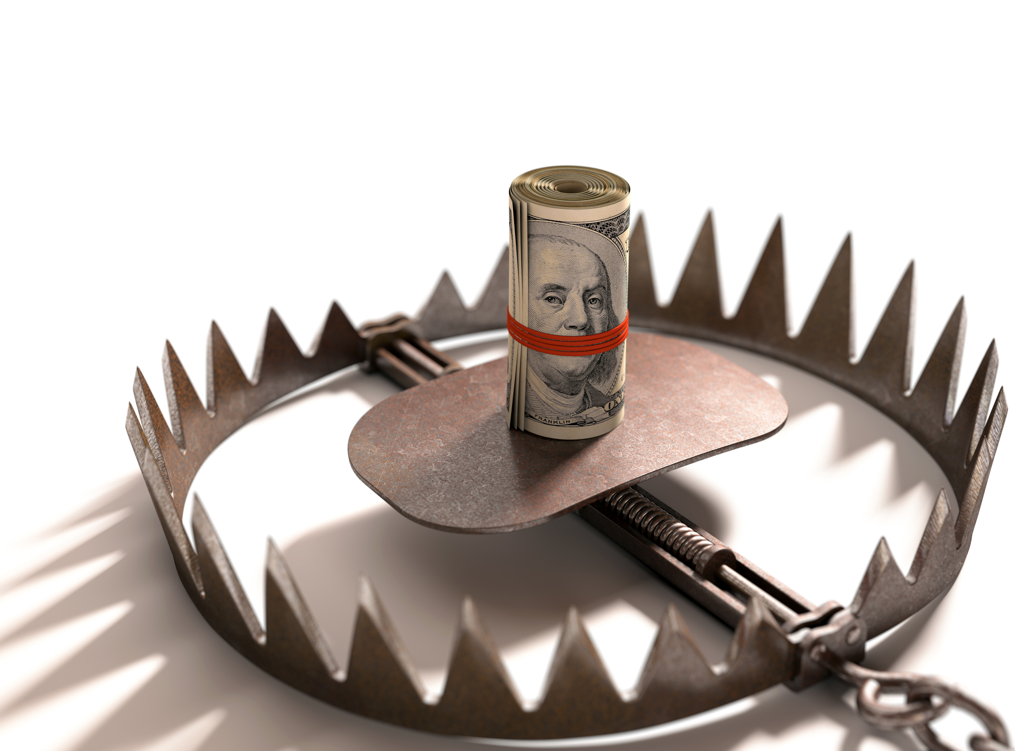 roll of hundred dollar bills in middle of bear trap