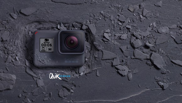 GoPro's HERO6 Black camera sitting in charcoal-colored rock