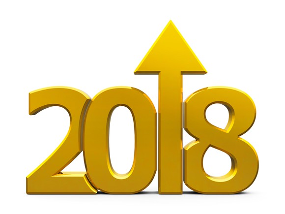 2018 written in golden letters with an upward arrow representing the numerical digit 1.