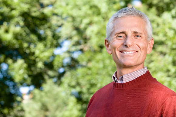Smiling senior man outdoors