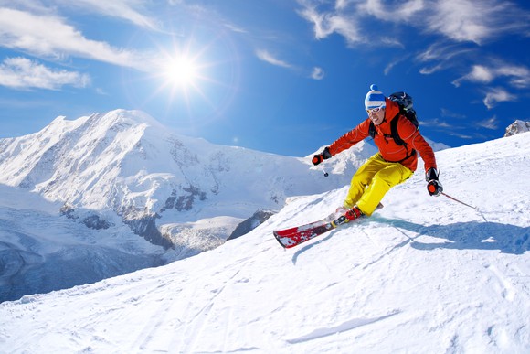 Man skiing down a mountain.
