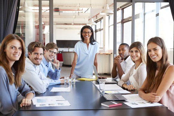 Young professionals at a conference room table