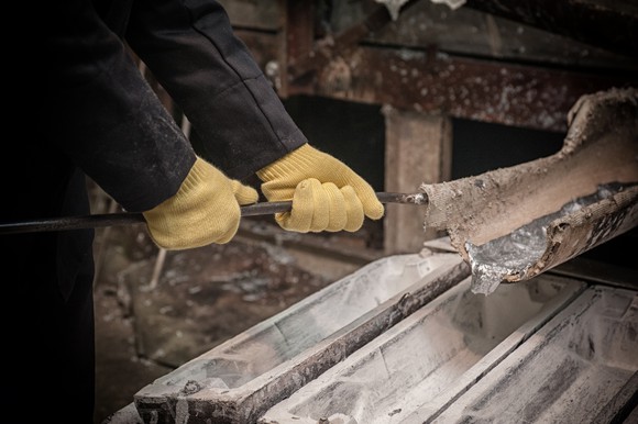 Aluminum being poured into an ingot mold