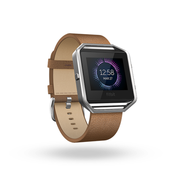 Fitbit Ionic watch with leather band.