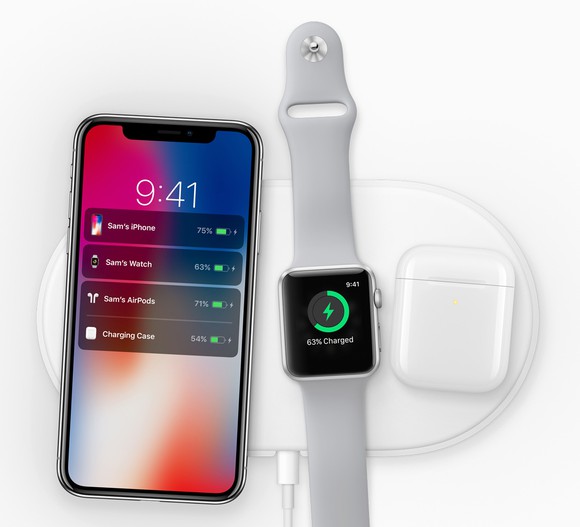 iPhone X, Apple Watch, and AirPods charging wirelessly
