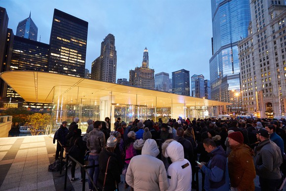 Apple customers waiting in line at an Apple Store in Michigan on the iPhone X launch day