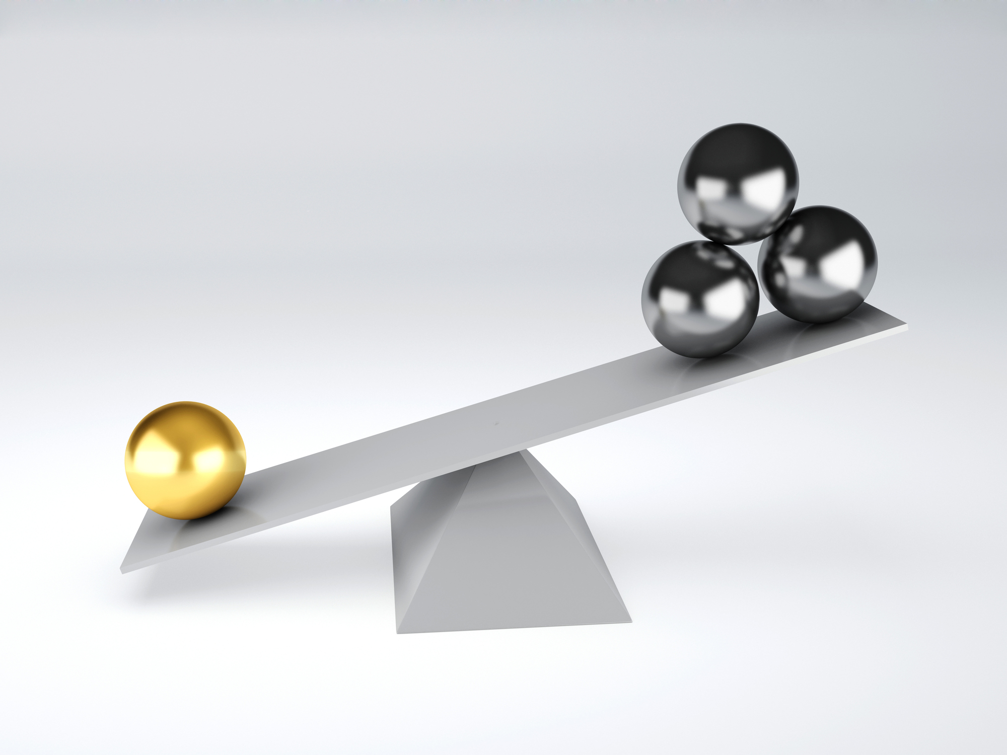 Picture of a scale with one side weighed down by a gold ball.
