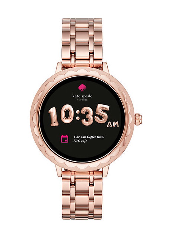 The new Kate Spade smartwatch in pink with a black face. The watch is fully digital and has a pink gold metal wristband.
