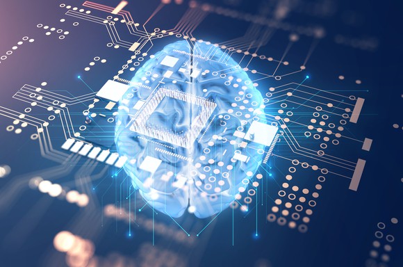 Image of brain on top of microchip.