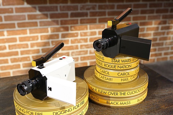 Kodak cameras sitting on film wheels