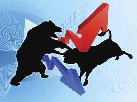 A bull and a bear fighting.