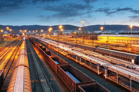 Rail yard at dusk.