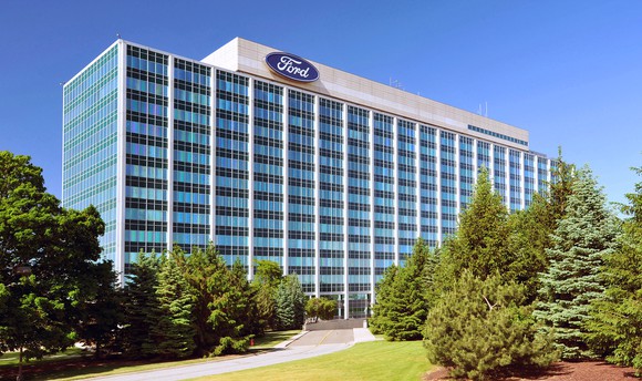 Ford's headquarters building, with part of its front lawn visible