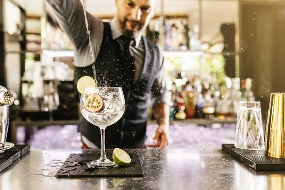 Bartender pouring a drink.