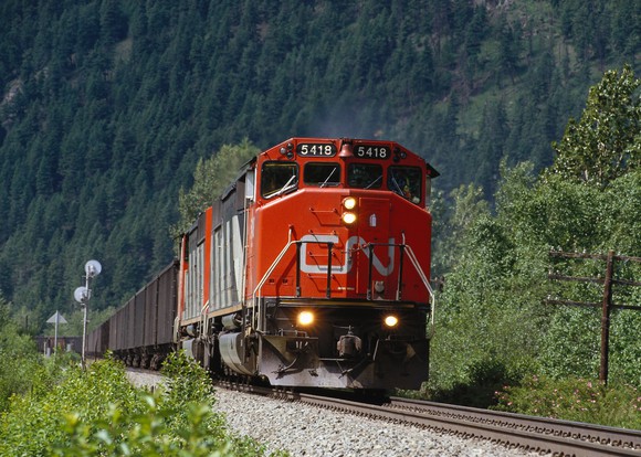 A train moving along the tracks.