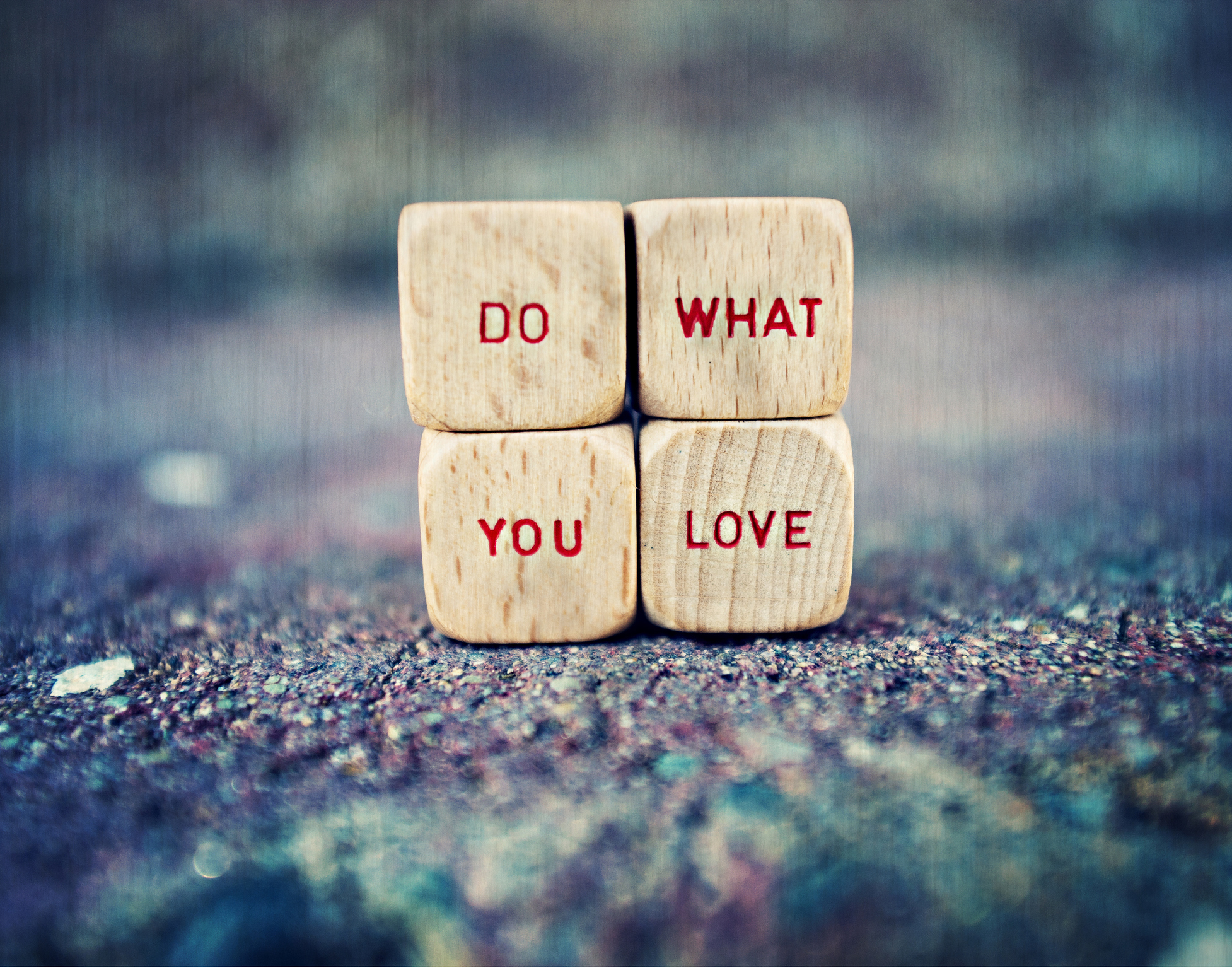 wood blocks with the words DO WHAT YOU LOVE printed on them.