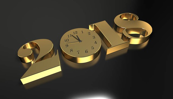 2018 made out of gold with a clock in the zero.