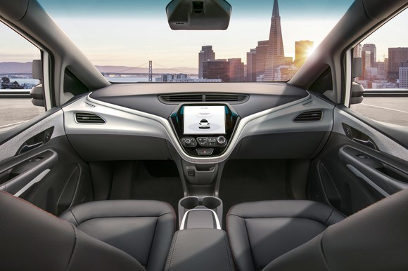The interior of the Cruise AV, which doesn't have a steering wheel.