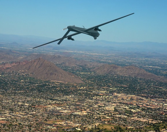 Drone flying above a city.