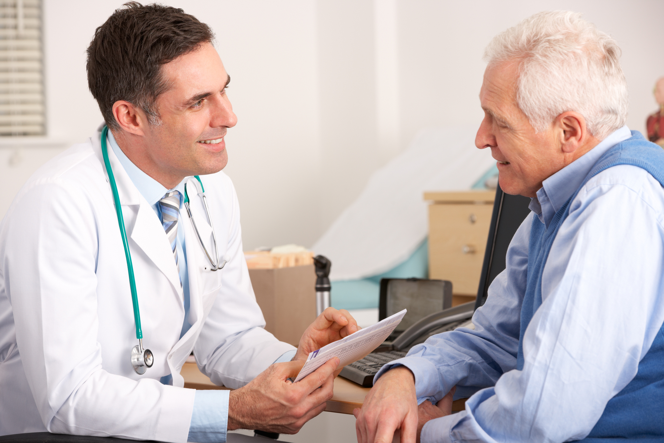 Doctor talking to a senior man