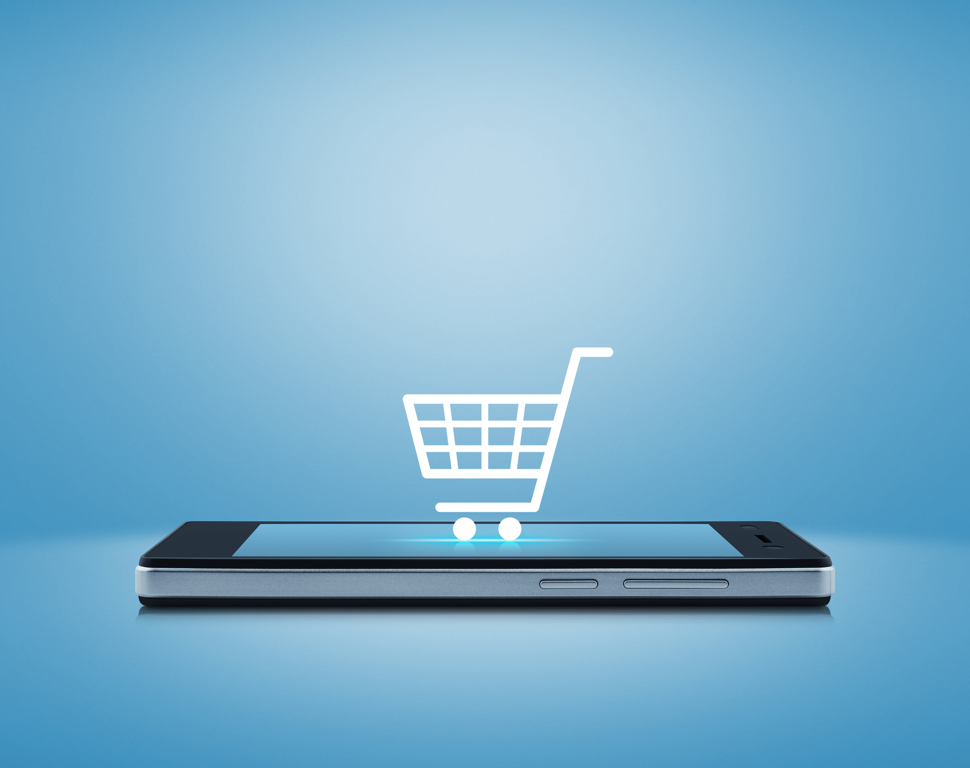 A shopping cart icon on top of a mobile phone.